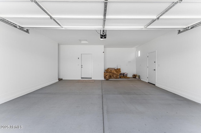1301 W Via De Olivos, Queen Creek, AZ 85140 - garage featuring a garage door opener and baseboards