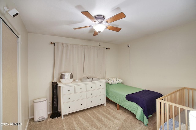 3203 W Libby St, Phoenix, AZ 85053 - bedroom with light carpet and a ceiling fan