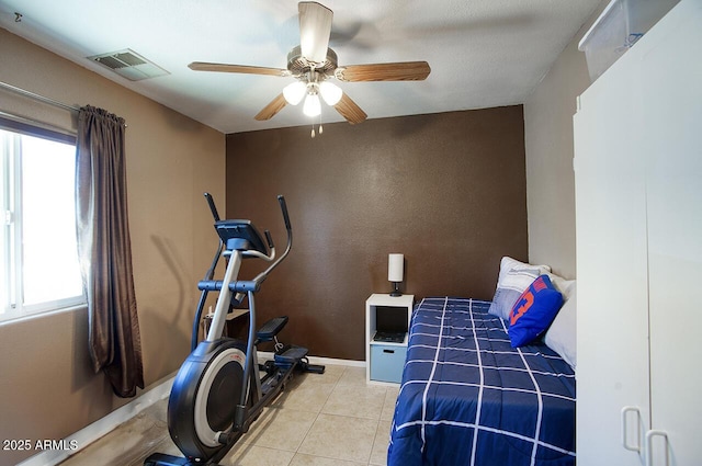 3203 W Libby St, Phoenix, AZ 85053 - tiled bedroom with ceiling fan