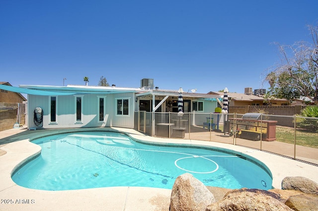 3203 W Libby St, Phoenix, AZ 85053 - view of swimming pool with a patio area