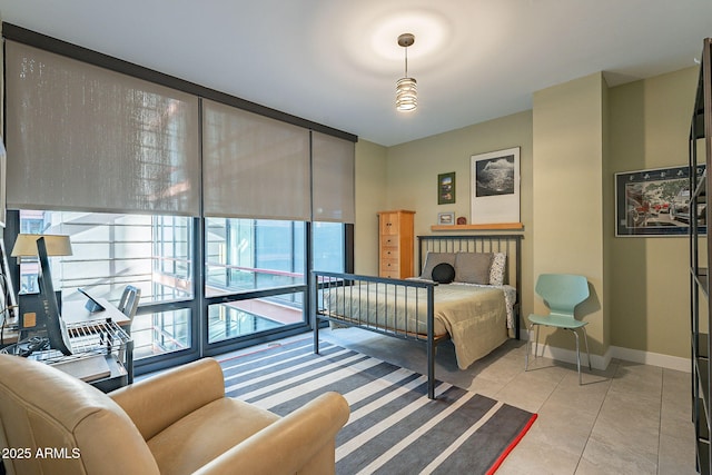 bedroom featuring light tile patterned flooring