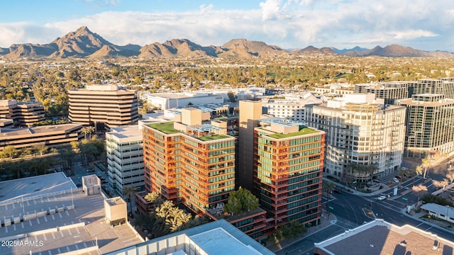 property's view of city featuring a mountain view