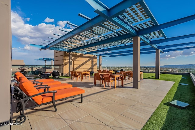 view of patio / terrace featuring exterior bar and a pergola