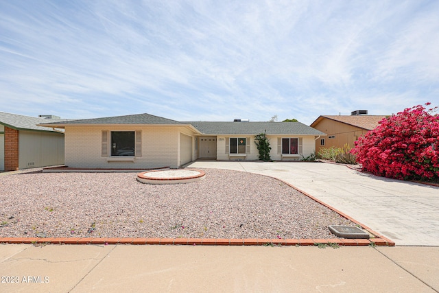 ranch-style home with a garage