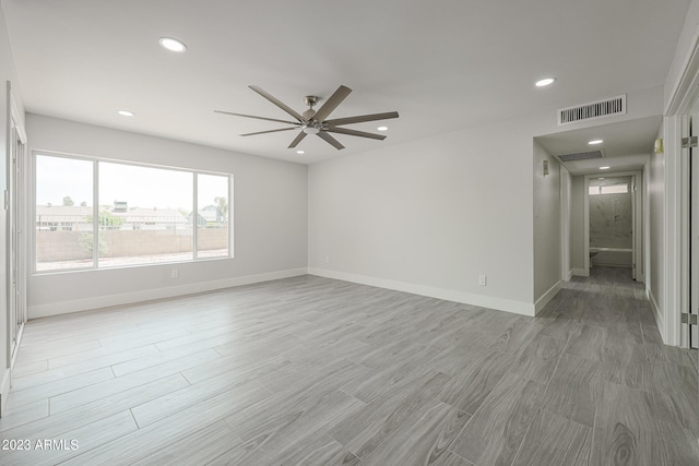 spare room featuring ceiling fan