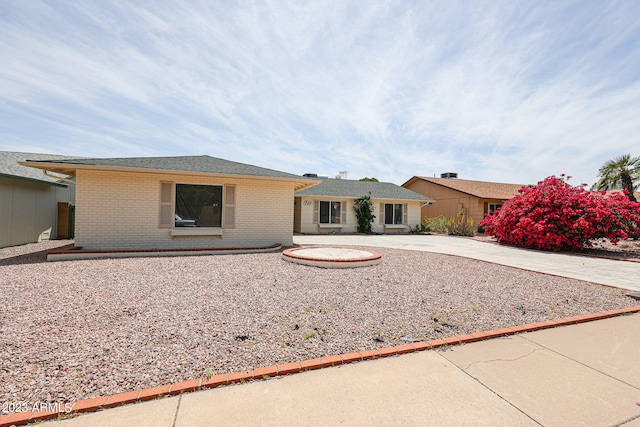 ranch-style house featuring a patio area