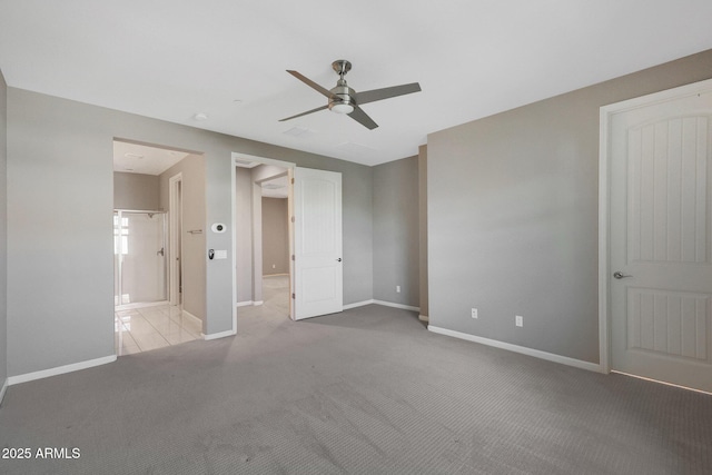 carpeted empty room with ceiling fan