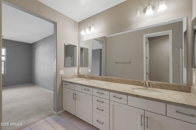 bathroom with vanity and tile patterned flooring