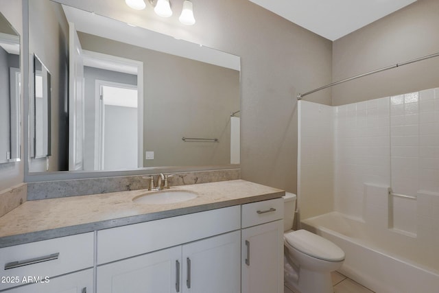 full bathroom featuring vanity, tile patterned floors, bathtub / shower combination, and toilet