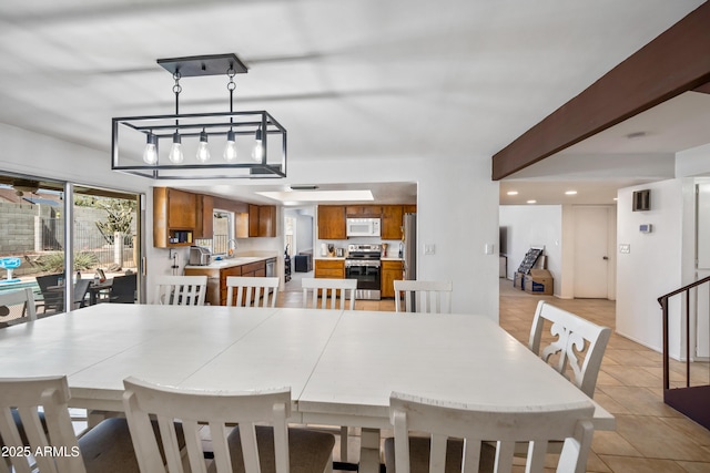 4136 W Hearn Rd, Phoenix, AZ 85053 - dining space featuring light tile patterned floors and recessed lighting