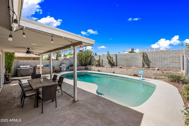 4136 W Hearn Rd, Phoenix, AZ 85053 - view of pool featuring area for grilling, a patio, a fenced backyard, and outdoor dining area