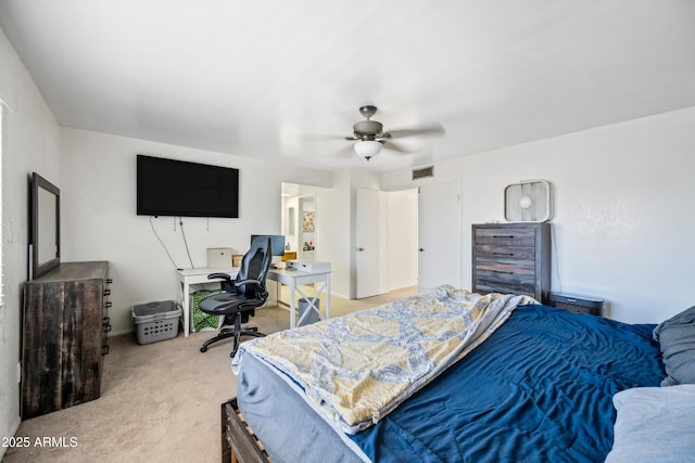 4136 W Hearn Rd, Phoenix, AZ 85053 - bedroom with light carpet, ceiling fan, and a desk