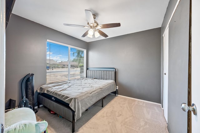 4136 W Hearn Rd, Phoenix, AZ 85053 - carpeted bedroom featuring baseboards and ceiling fan