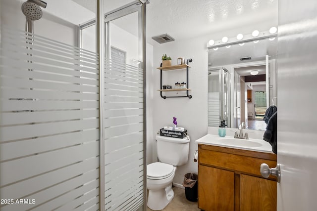 4136 W Hearn Rd, Phoenix, AZ 85053 - full bath featuring a shower stall, toilet, and vanity