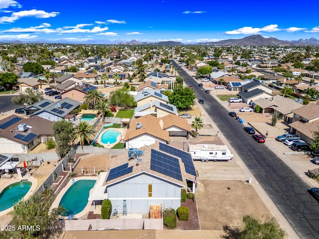 4136 W Hearn Rd, Phoenix, AZ 85053 - aerial perspective of suburban area with a pool and a mountain backdrop