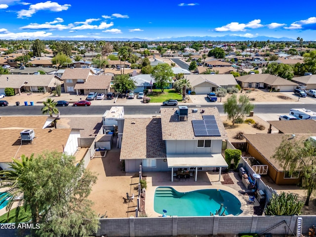 4136 W Hearn Rd, Phoenix, AZ 85053 - aerial view of residential area with a pool and a mountainous background