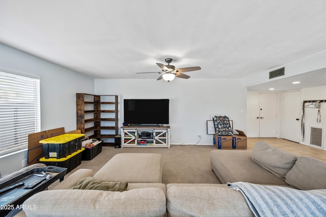 4136 W Hearn Rd, Phoenix, AZ 85053 - carpeted living area with ceiling fan
