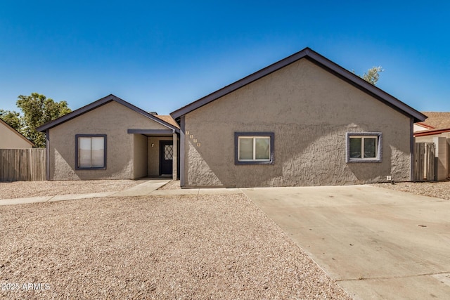 7506 W Sells Dr, Phoenix, AZ 85033 - view of front of home with stucco siding and a patio