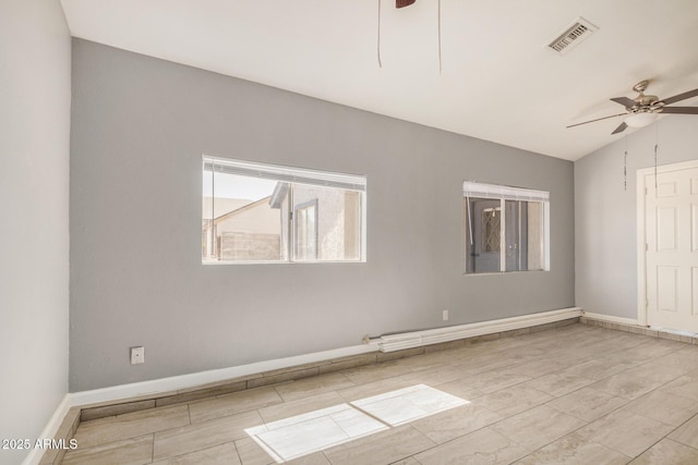 7506 W Sells Dr, Phoenix, AZ 85033 - empty room with a ceiling fan, lofted ceiling, baseboards, and wood tiled floors
