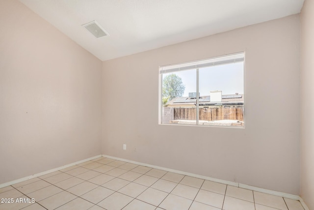7506 W Sells Dr, Phoenix, AZ 85033 - empty room featuring baseboards and light tile patterned floors