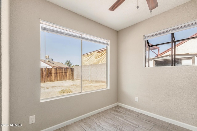 7506 W Sells Dr, Phoenix, AZ 85033 - spare room featuring a ceiling fan and baseboards