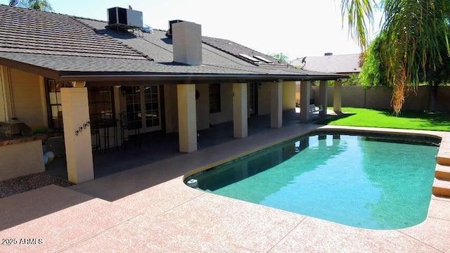 6372 W Redfield Rd, Glendale, AZ 85306 - view of pool featuring a patio and central AC unit