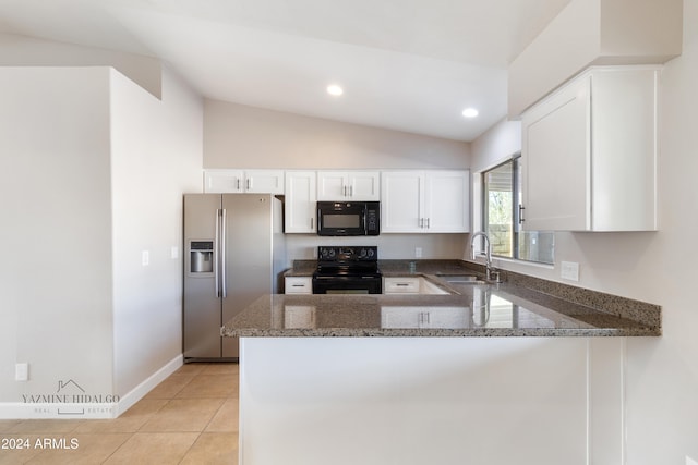 kitchen with lofted ceiling, black appliances, sink, kitchen peninsula, and white cabinetry