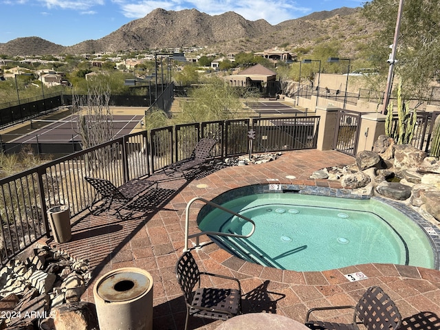 13789 E Geronimo Rd, Scottsdale, AZ 85259 - view of swimming pool with a mountain view and a hot tub