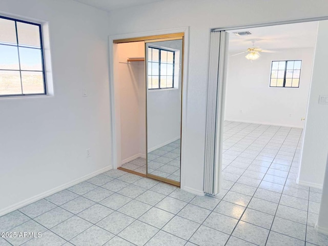 empty room featuring ceiling fan