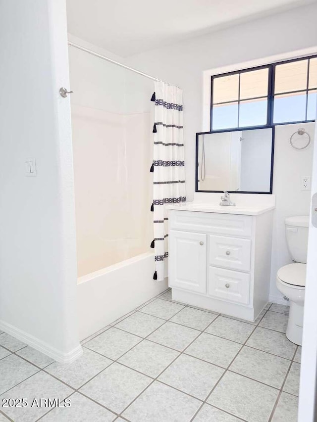 full bathroom with tile patterned floors, vanity, toilet, and shower / bathtub combination with curtain