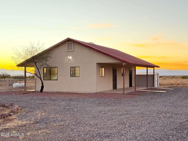 view of front of home with an outdoor structure