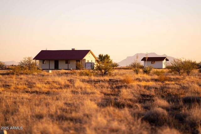 exterior space featuring a mountain view