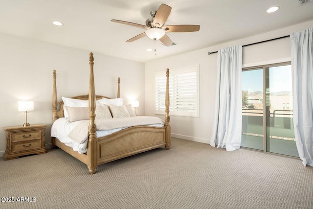 carpeted bedroom with multiple windows, access to outside, and ceiling fan