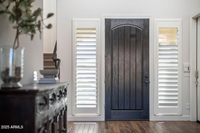 entrance foyer featuring dark hardwood / wood-style flooring