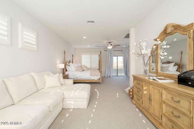 bedroom with light carpet, access to exterior, and ceiling fan