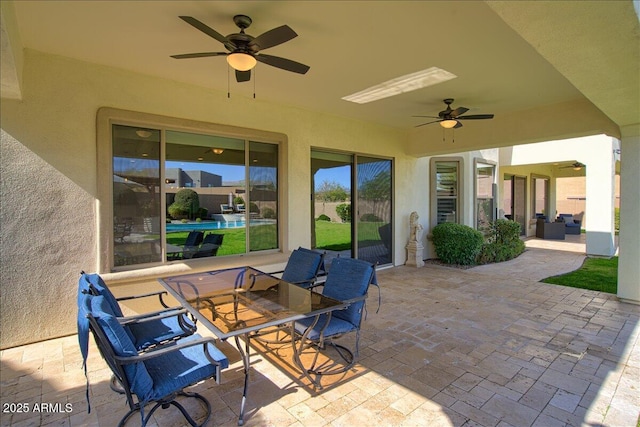 view of patio / terrace with ceiling fan