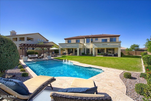 view of swimming pool with a lawn, a pergola, a patio, an outdoor living space, and pool water feature