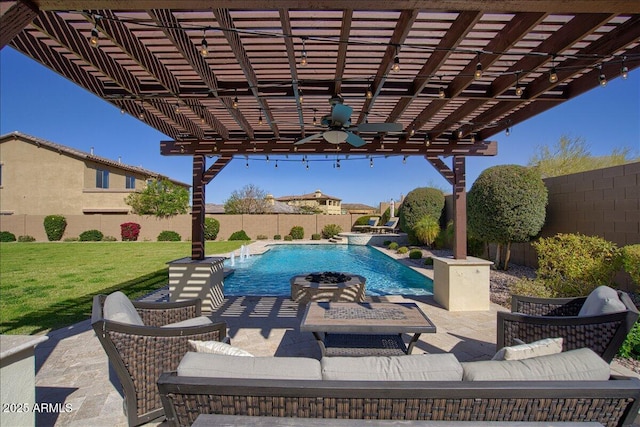 view of swimming pool with pool water feature, a lawn, a pergola, ceiling fan, and an outdoor hangout area