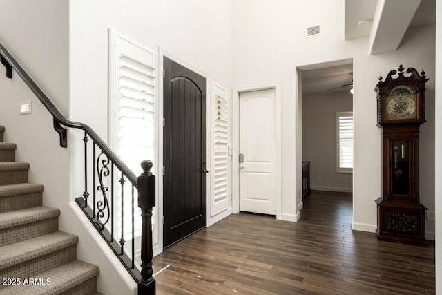 foyer featuring dark hardwood / wood-style floors and ceiling fan