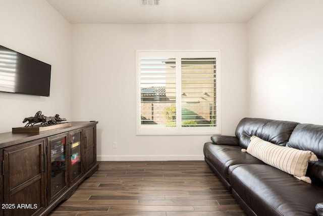 living room with dark hardwood / wood-style floors
