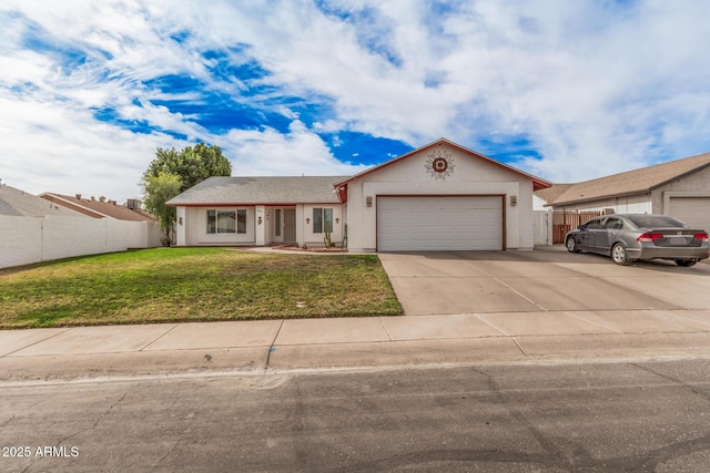 view of front of property with an attached garage, fence, concrete driveway, and a front yard