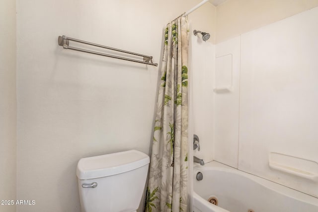 full bathroom featuring shower / bath combo and toilet