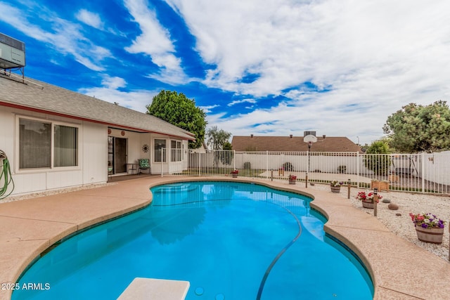 view of pool with a patio area and a fenced backyard