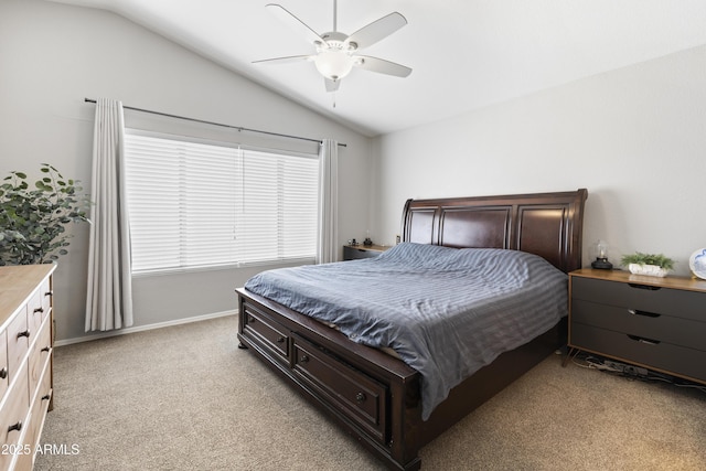 bedroom featuring lofted ceiling, light carpet, and ceiling fan