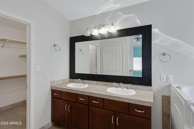 bathroom featuring vanity and tile patterned flooring