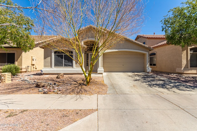 view of front of property featuring a garage