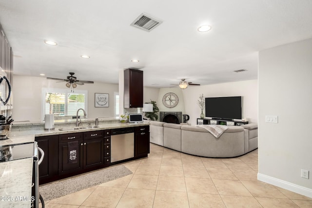 1311 W Ellis St, Mesa, AZ 85201 - kitchen with stainless steel appliances, a ceiling fan, a sink, recessed lighting, and light stone countertops
