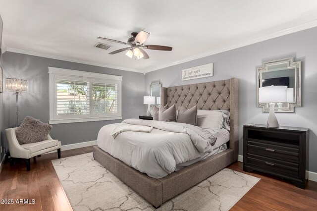 1311 W Ellis St, Mesa, AZ 85201 - bedroom featuring ornamental molding, wood finished floors, baseboards, and ceiling fan