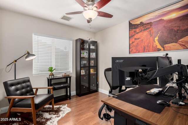 1311 W Ellis St, Mesa, AZ 85201 - home office featuring a ceiling fan, wood finished floors, and baseboards