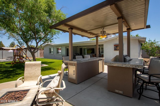 1311 W Ellis St, Mesa, AZ 85201 - view of patio featuring a playground and ceiling fan